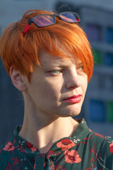Smiling pretty young woman with short hair