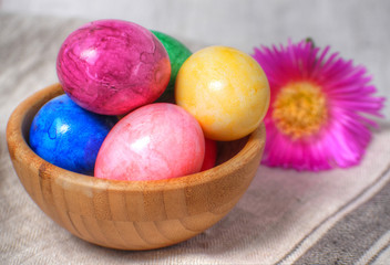 Obraz na płótnie Canvas Easter eggs on wooden background. Happy easter.