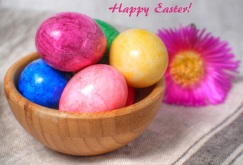 Easter eggs on wooden background. Happy easter.
