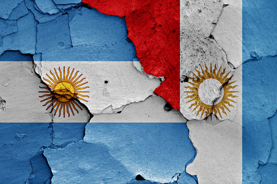 flags of Argentina and Cordoba Province painted on cracked wall