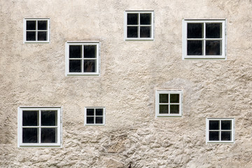 facade of an old building with small windows