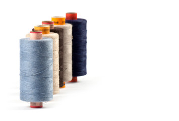 Spools with color threads.
