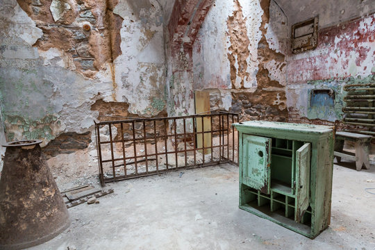 Jail interior with rusty cell.