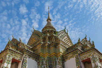 Fototapeta na wymiar ordination hall in temple of Thailand blue sky and clound background