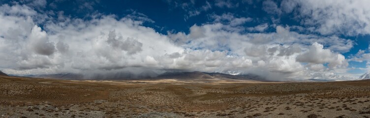 Fototapeta na wymiar Clouds reaching over the Little Pamir in Afghanistan