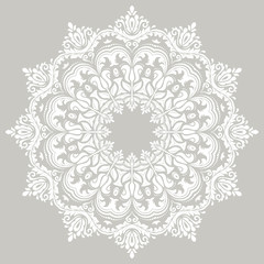 Elegant round white ornament in classic style. Abstract traditional pattern with oriental elements