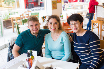 Mother with adult son and daughter