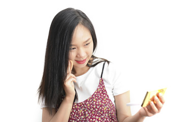 Attractive Asian woman Applying Her Makeup ioslate on white background