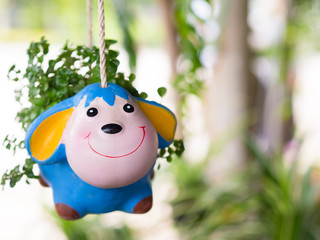 Fototapeta premium Deer doll made of clay. flowerpot.