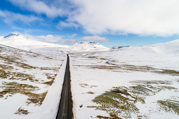 Aerial view of road and snowy mountains, Iceland