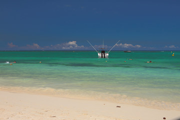 Sandy beach on ocean coast. Trou aux Biches, Mauritius