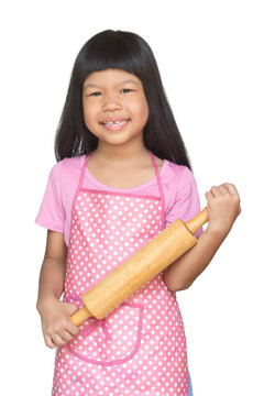 asian child holdign a dough roller isolated