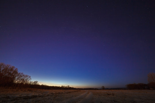 Starry sky on a background of the morning dawn.