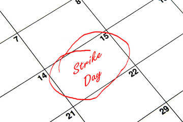 Strike Day Circled on A Calendar in Red