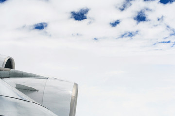 Naklejka na ściany i meble wings of A380 over the clouds