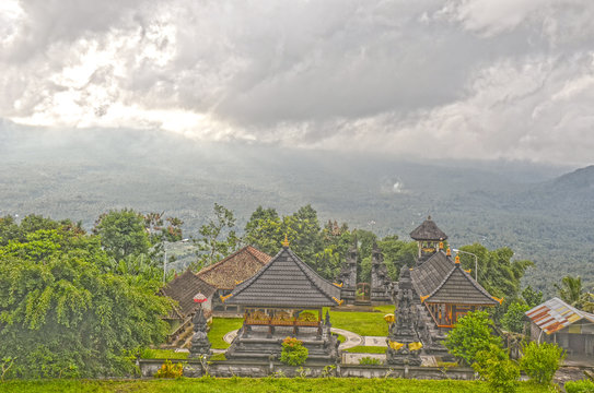 Lempuyang temple with clouds, fog and sun light, Bali, Indoneisia