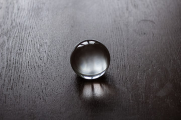 Crystal fortune-telling ball placed on a table