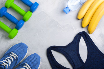Flatlay sport composition with sport equipment outfit.