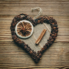 decorated heart on a wooden background