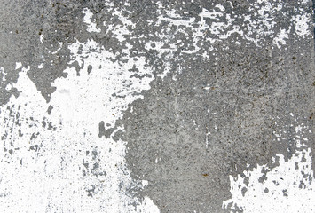 Texture the concrete surface with peeling white paint.