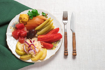 Pickled vegetables - cucumber, tomato, pepper, cabbage. Preserved food