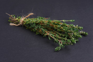 Bunch of thyme on black background