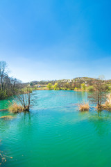      Beautiful countryside landscape, clear green water on Mreznica river in Croatia 