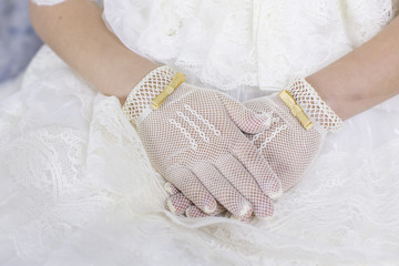 hands of prying girl going to the first holy communion