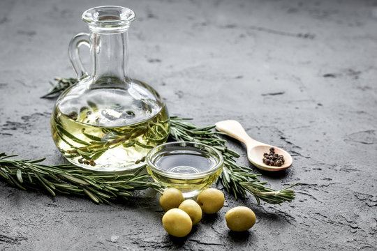 olive oil with ingredients on kitchen table background mockup