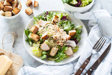 Caesar salad in white plate