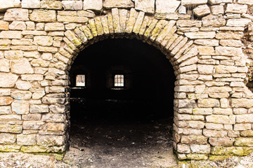 Fototapeta na wymiar Gate of a medieval industrial building.
