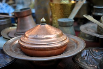 Antique objects displayed on flea market.