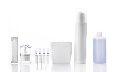 Blank cosmetic tubes on white background. Place for your text.