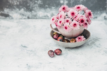 Shabby chic flowers with Easter eggs background