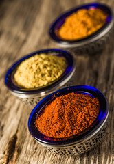 pepper on wooden background/ mixture of peppers hot pepper, red pepper, black pepper, white pepper, green pepper, background