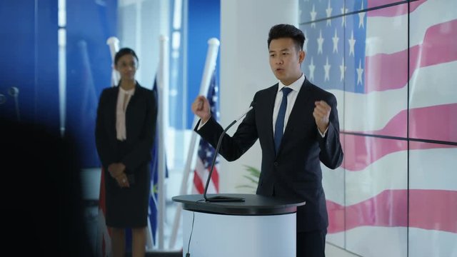 Politician making a passionate speech at political rally or press conference
