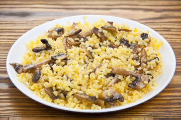 Delicious home made pilaw from wheat on plate