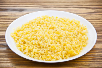 Delicious home made pilaw from wheat on plate