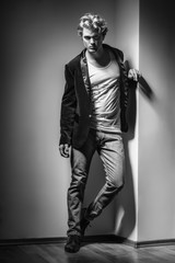 Sensual portrait of a handsome muscular man with open shirt