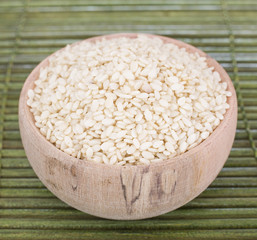 Sesame seeds in the wooden bowl (Sesamum indicum)
