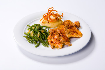 Roast chicken breast, mashed potatoes and green beans