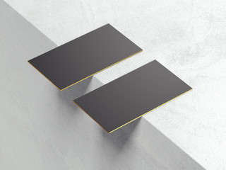 Two blank black business cards on the edge. 3d rendering