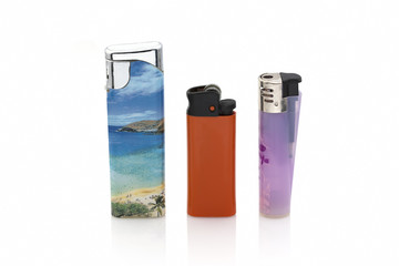 A color plastic lighter on white background