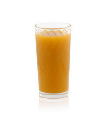 Yellow juice in a glass cup on a white background without shadow