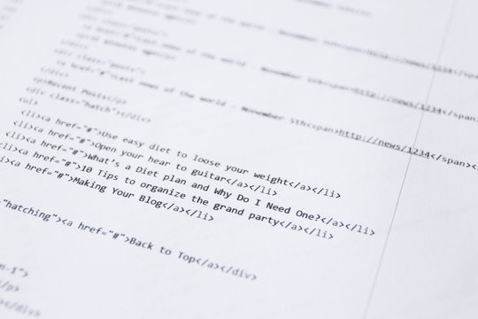 Script code printed on paper, closeup