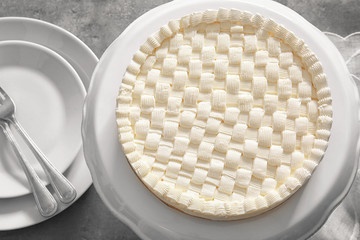 Delicious cheesecake on stand