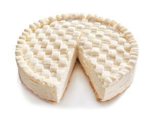 Delicious sliced cheesecake on white background