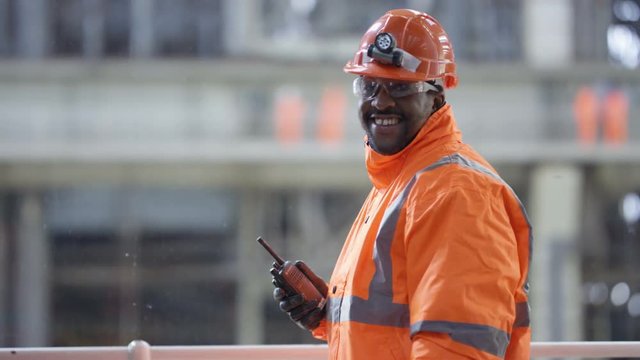  Portrait of smiling female engineer in the power industry.