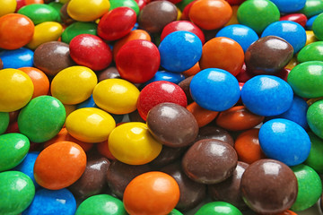 Fototapeta na wymiar Delicious colorful candies background