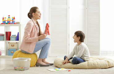 Cute little boy at speech therapist office